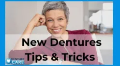 Smiling woman with cosmetic dentures fitted by a clinical dental technician