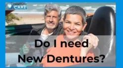Smiling couple with new dentures fitted by a clinical dental technician